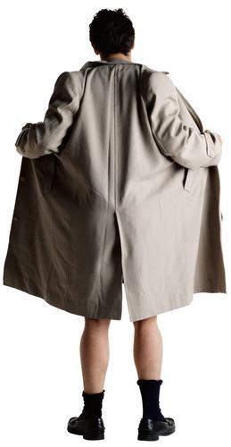 Man flashing in tan trench coat against a a white background in an act of violating CRS 18-7-302
