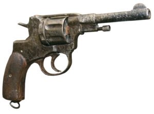 isolated rusty obsolete vintage sixshooter on white background