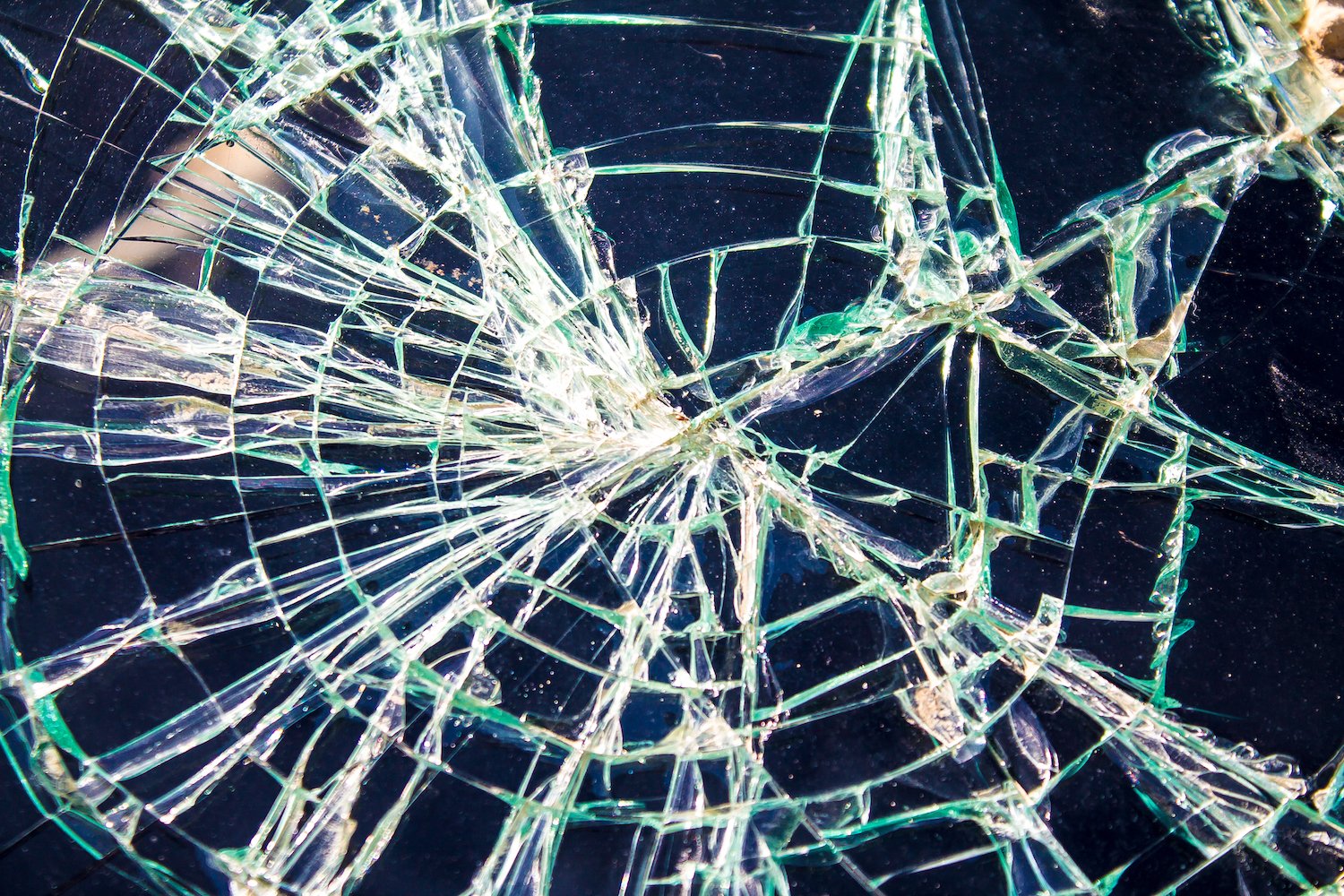 Tinted car window seriously cracked after a car accident