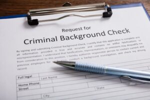 paper that says "criminal background check", which is one of the documents you need to get a record seal