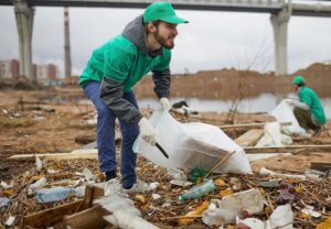 People picking up trash for community service