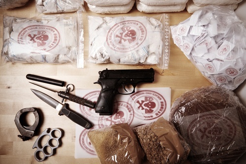 Drugs and weapons to illustrate inmate contraband in violation of CRS 18-8-204.1