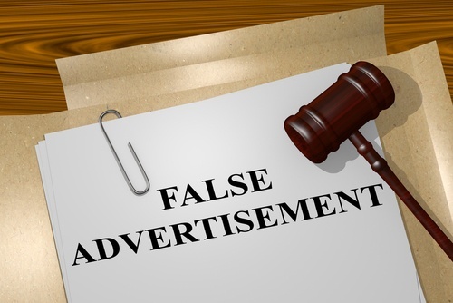 File folder marked "False Advertising" with a gavel nearby