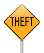 sign that reads "Theft" 