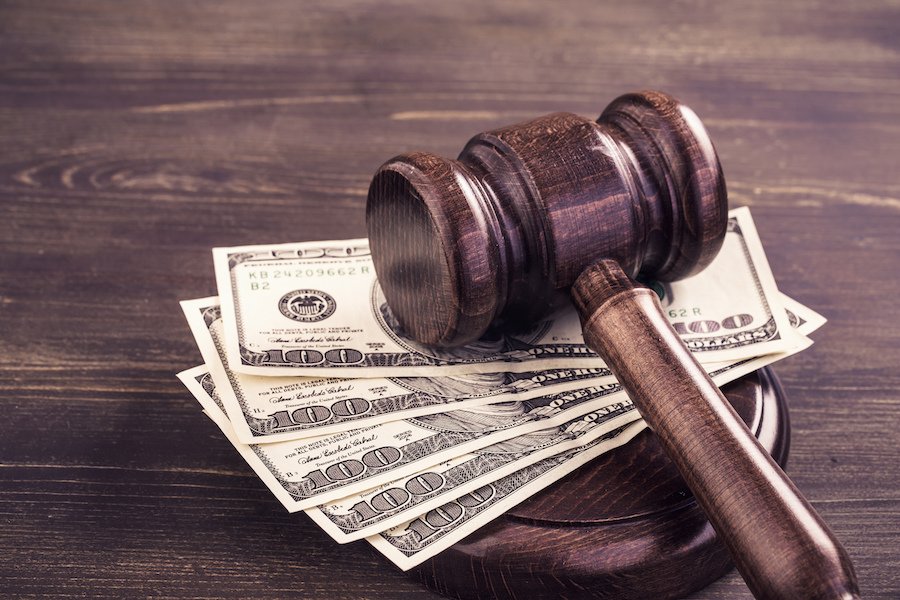 Gavel and some dollars banknotes.