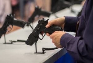 Man looking at gun in store
