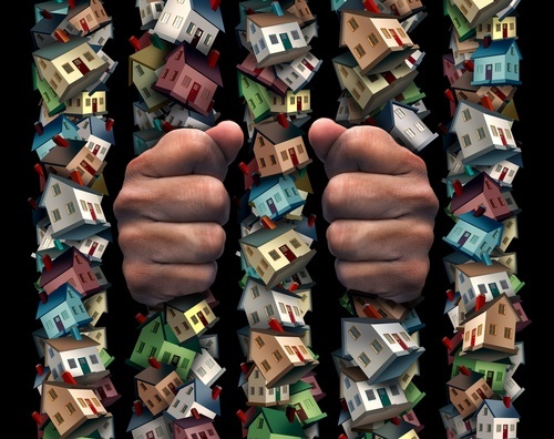 Hands holding jail bars made out of houses, signifying "home detention," a type of alternative sentencing where defendants can serve their sentence at home rather than in jail