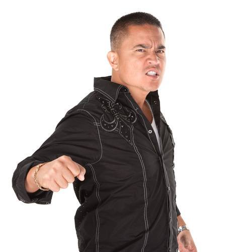 Angry man holding his hand in a punching position 