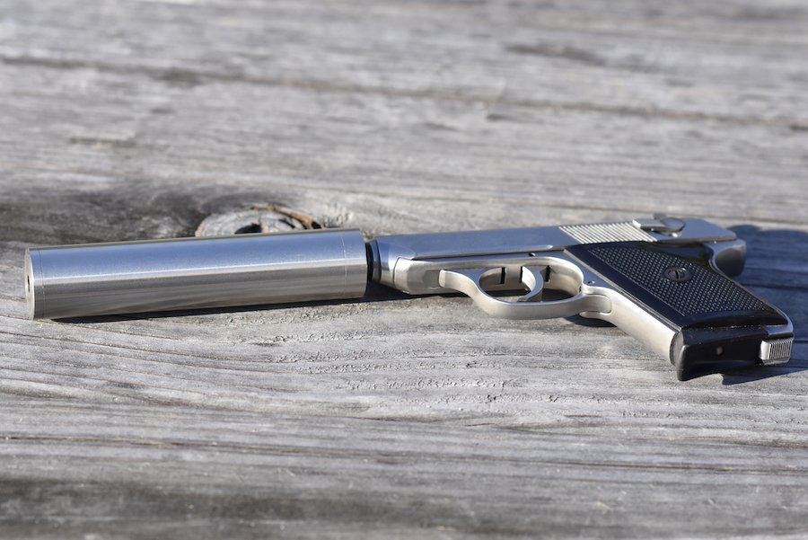 A pistol with an attached silencer, which is illegal to knowingly possess in Colorado