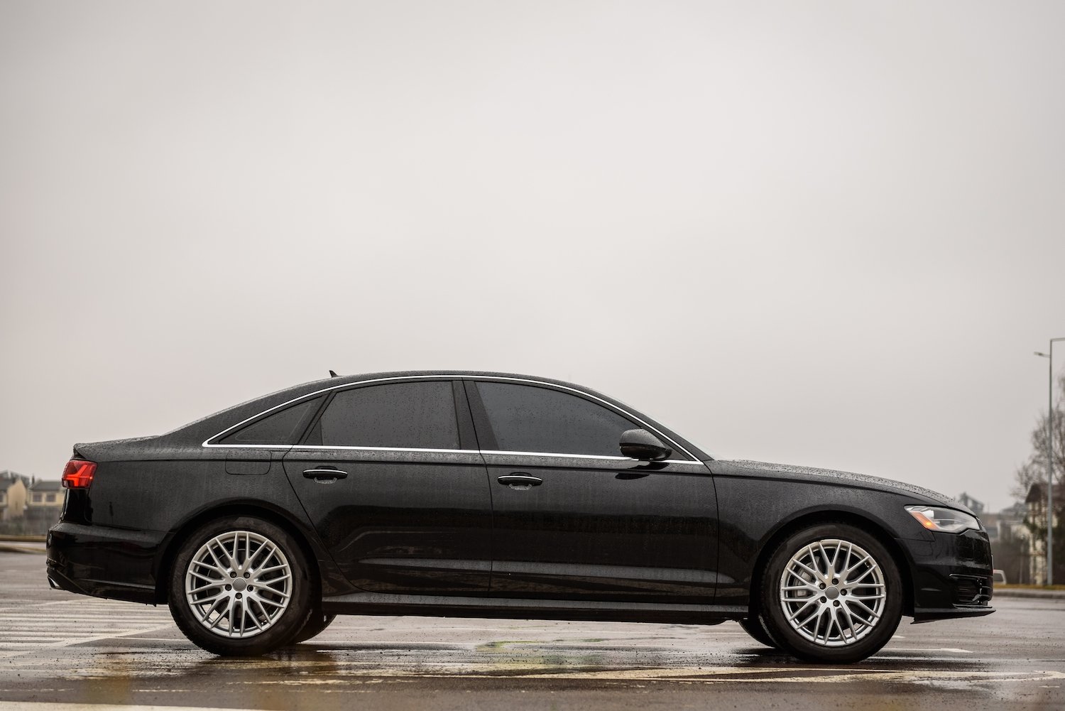 Sedan with darkly tinted front and rear windows in violation of CRS 42-4-227