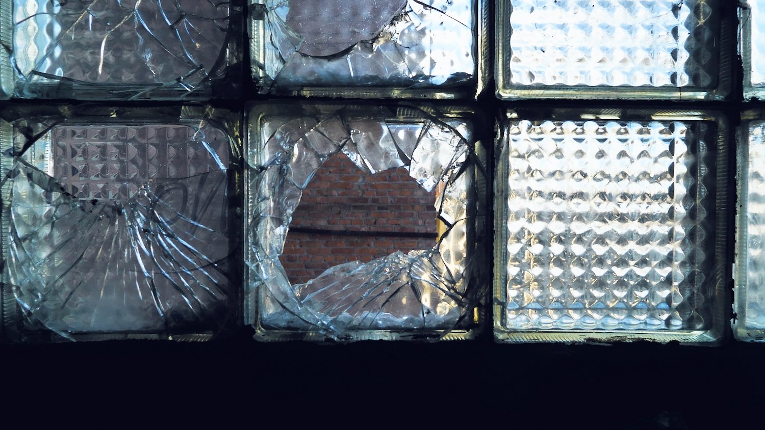 Broken windows following an act of criminal mischief