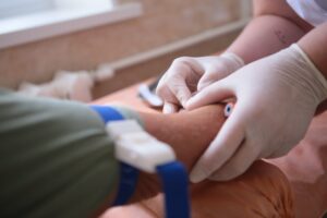 DUI defendant being forced to submit to a blood draw after a DUI arrest refusal